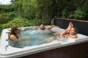 Stay Home and Soak in The Garden Hot Tub